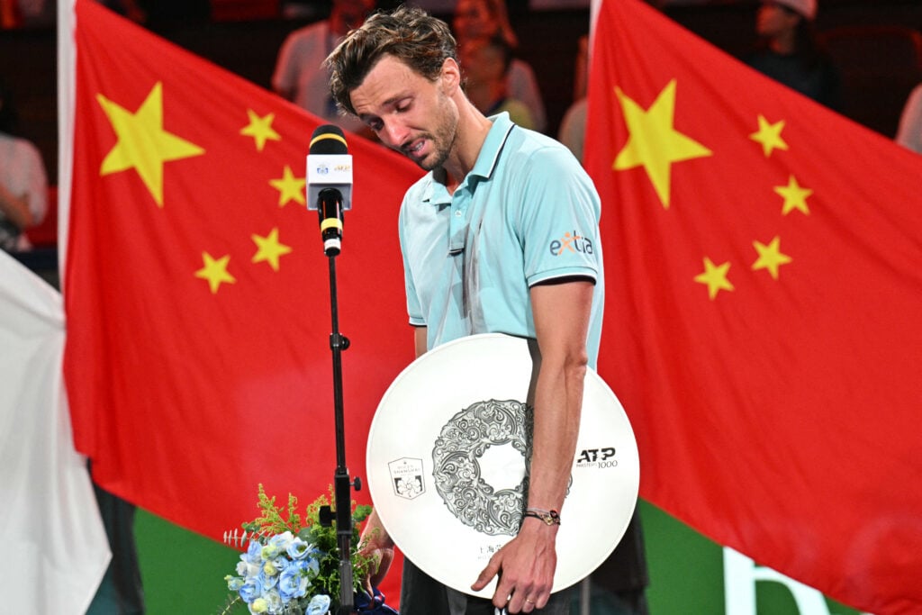 Arthur Rinderknech reacts while speaking during the presentation ceremony after his defeat against Monaco's Valentin Vacherot during the men's singles final at the Shanghai Masters tennis tournament in Shanghai.