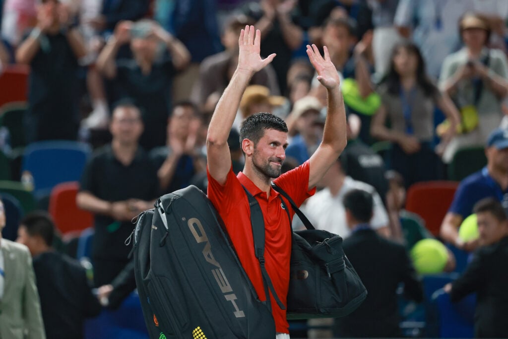 Novak Djokovic leaves the court in Shanghai after losing in the semifinals.