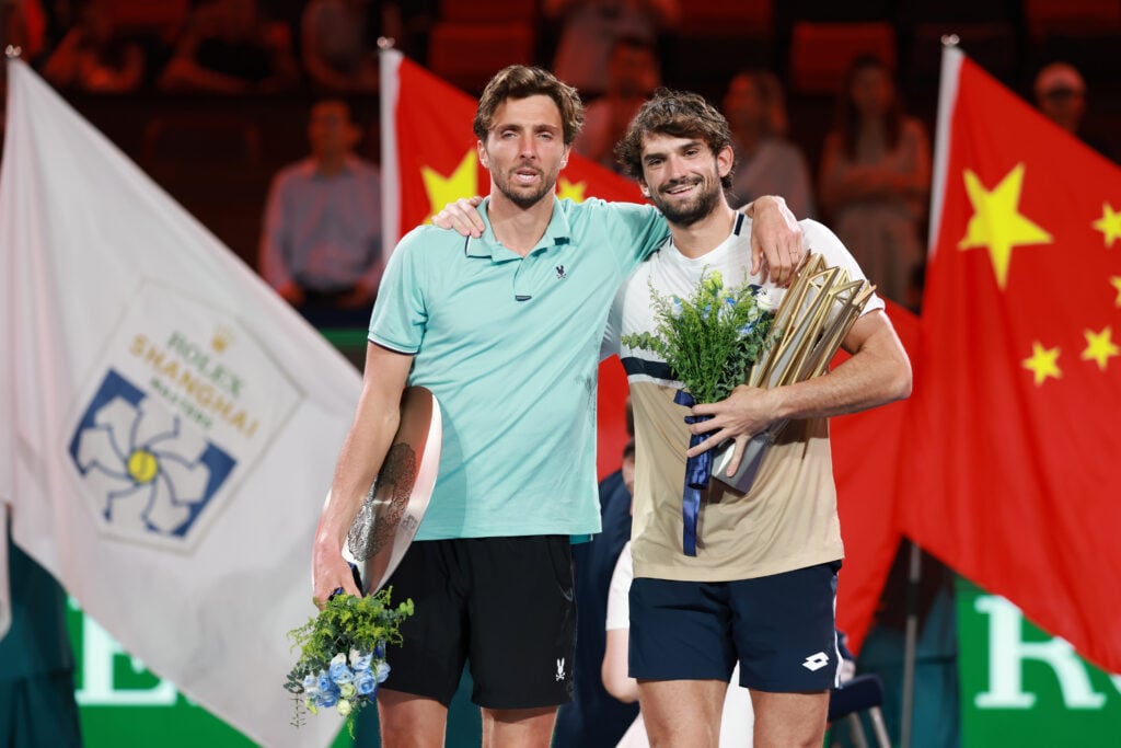 Valentin Vacherot of Monaco and Arthur Rinderknech of France pose with their winner's trophy during medal ceremony after .the Men's singles final on day 14 of the 2025 Shanghai Rolex Masters at Qi Zhong Tennis Center.