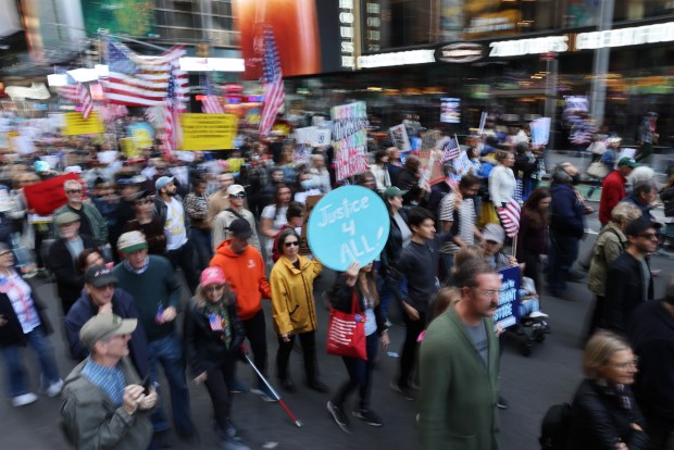 NEW YORK CITY - OCTOBER 18: Thousands of people participate in a "No Kings" protest in Manhattan on October 18, 2025, in New York City. Organizers expect millions to participate in cities and towns across the nation for the second "No Kings" protest to denounce the Trump administration. (Photo by Spencer Platt/Getty Images)