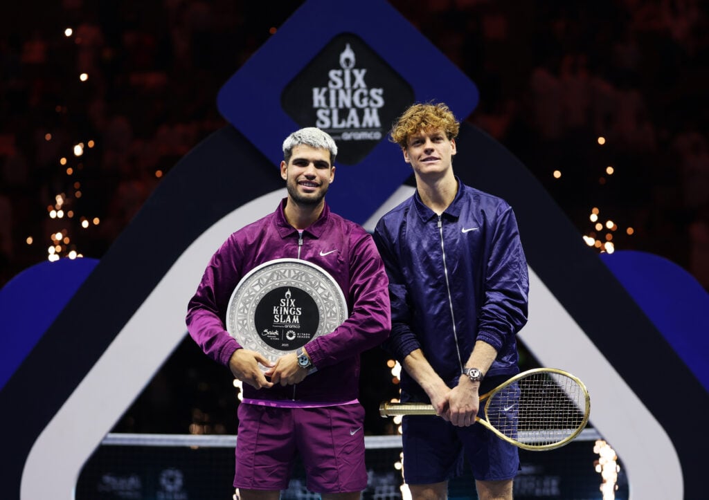 Carlos Alcaraz and Jannik Sinner pose with their titles at the Six Kings Slam in Saudi Arabia.
