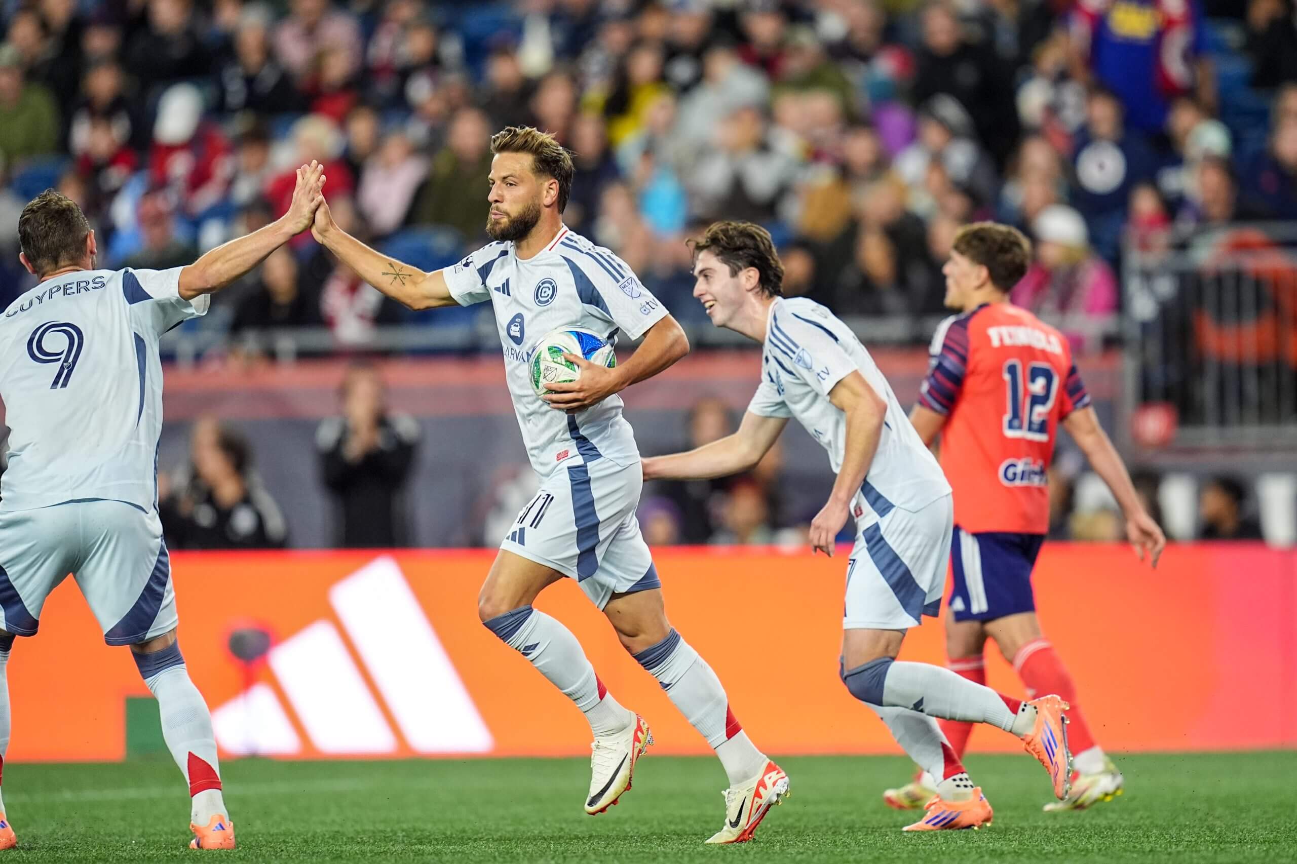 Chicago Fire star Philip Zinckernagel celebrates a goal vs. New England