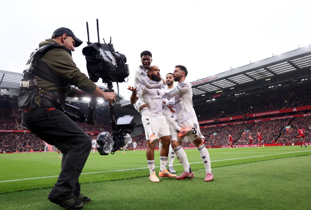 Bryan Mbeumo celebrates with teammates Amad Diallo, Matheus Cunha and Bruno Fernandes during the Premier League match between Liverpool and Manchester United at Anfield in 2025 in Liverpool, England.