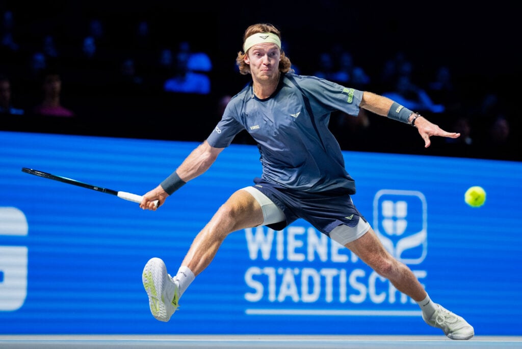 Andrey Rublev returns the ball to Britain's Cameron Norrie during their men's round of 16 singles match of the ATP Vienna Open tennis tournament in Vienna.