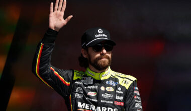 TALLADEGA, ALABAMA - OCTOBER 19: Ryan Blaney, driver of the #12 Menards/Dutch Boy Ford, waves to fans as he walks onstage during driver intros prior to the NASCAR Cup Series YellaWood 500 at Talladega Superspeedway on October 19, 2025 in Talladega, Alabama.
