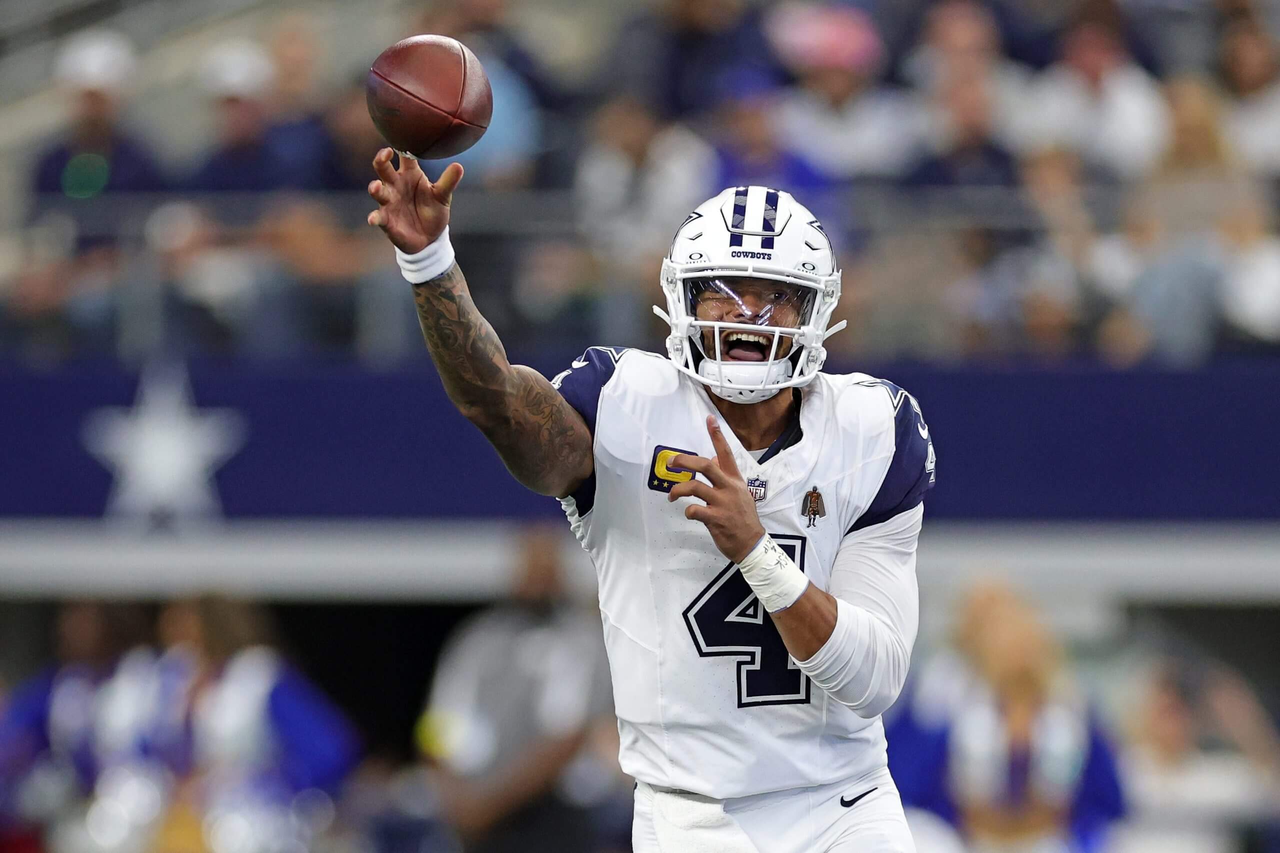 Cowboys quarterback Dak Prescott throws a pass during Sunday's victory over the Commanders.