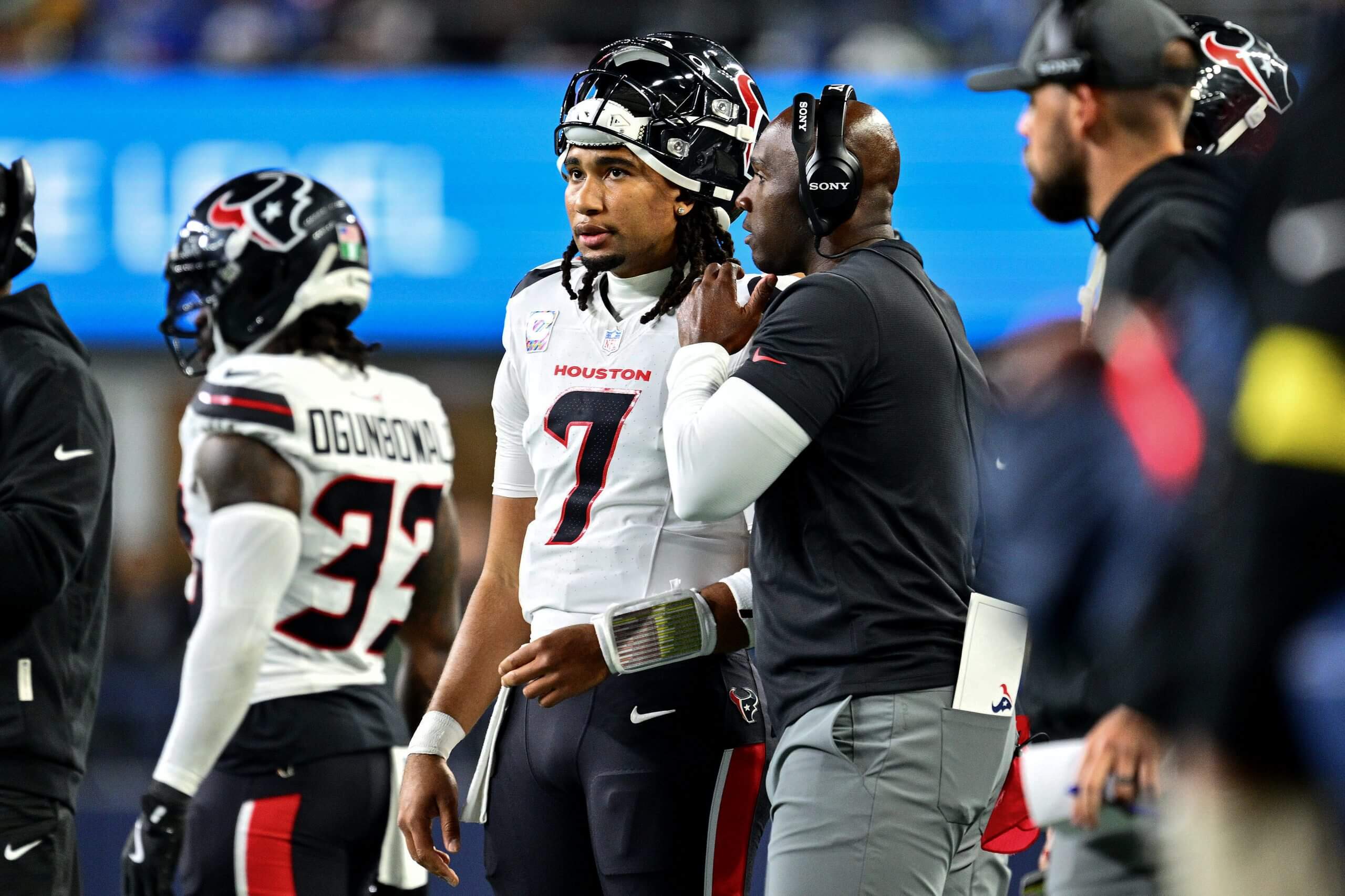C.J. Stroud #7 speaks with head coach Demeco Ryans of the Houston Texans against the Seattle Seahawks during the second quarter at Lumen Field on October 20, 2025 in Seattle, Washington.