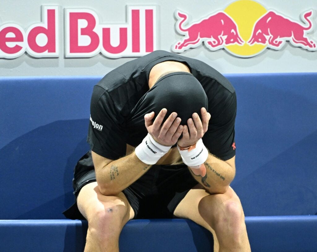Corentin Moutet emotionally reacts after beating Daniil Medvedev in Vienna.