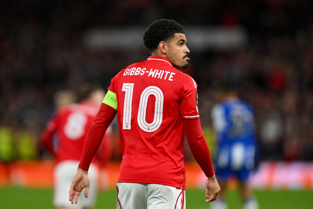 Morgan Gibbs-White in action for Nottingham Forest, facing away from camera.
