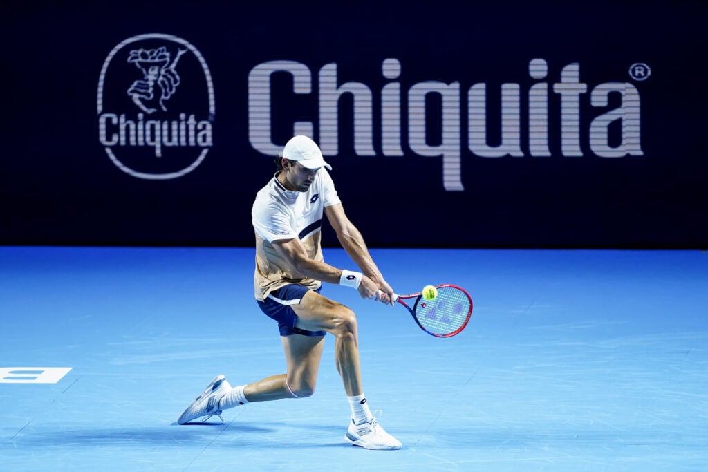Valentin Vacherot hits a backhand against Taylor Fritz at the 2025 Swiss Indoors