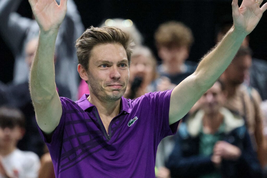 Nicolas Mahut reacts after the final match of his career at the Paris Masters