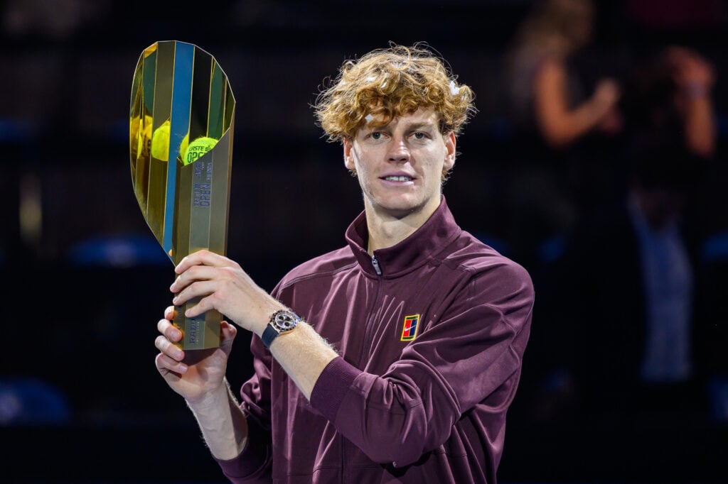 Jannik Sinner poses with the trophy after winning the 2025 Vienna Open title