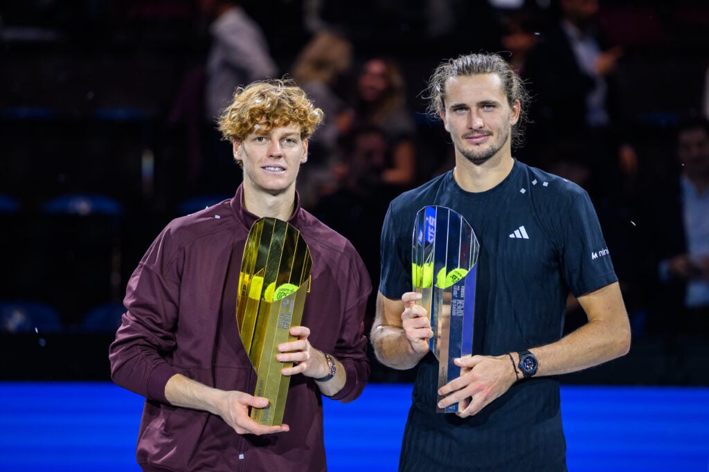 Jannik Sinner and Alexander Zverev hold their trophies after the 2025 Vienna Open final