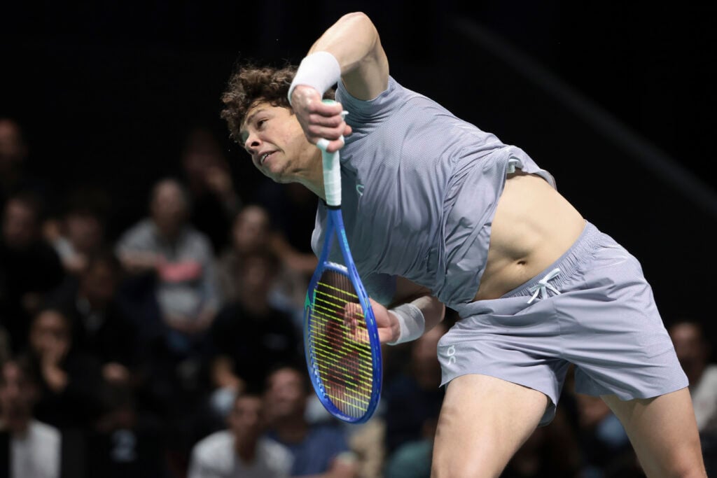 Ben Shelton serving at the Paris Masters.