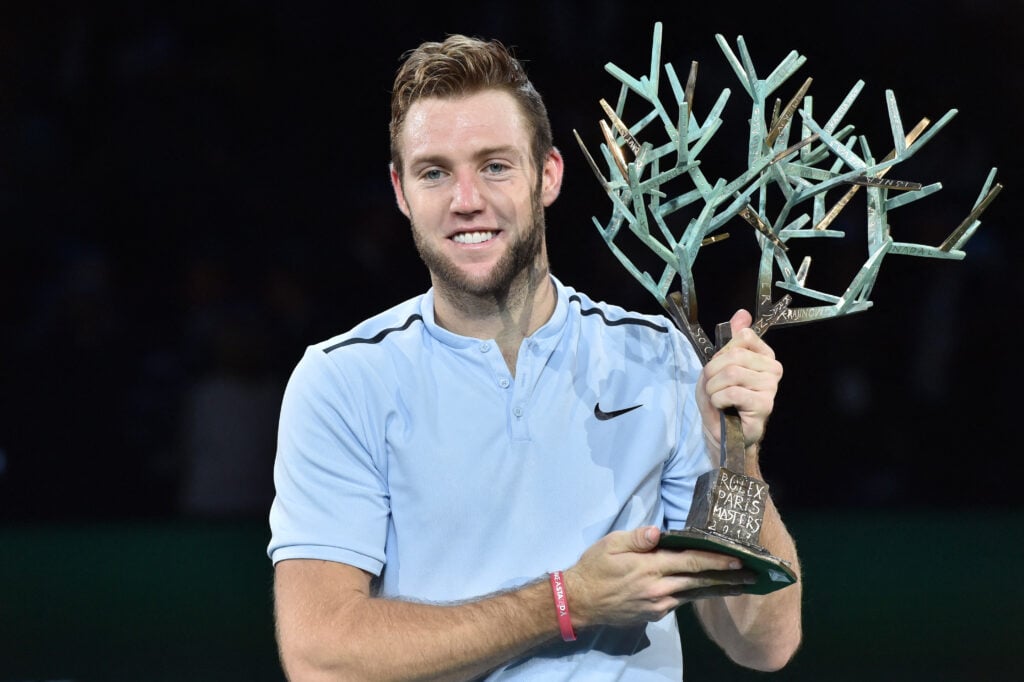 Jack Sock celebrates with the title after winning the 2017 Parus Masters