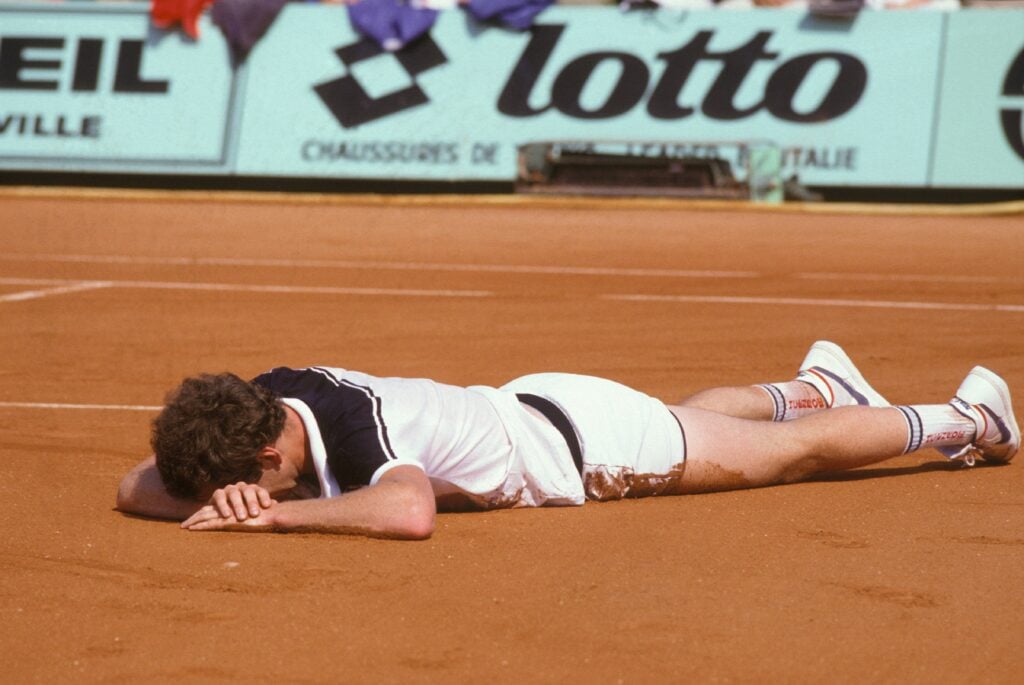 John McEnroe reacts at Roland Garros in 1984.