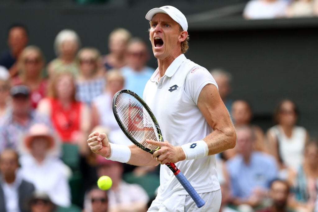 Kevin Anderson celebrates during his win over John Isner at Wimbledon in 2018