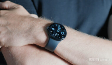 A Pixel Watch 3 on a user's wrist display the time.