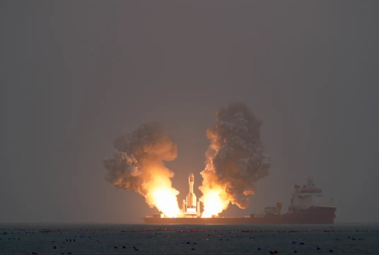 Huge commercial Chinese solid rocket launches 3 satellites from barge in the Yellow Sea
