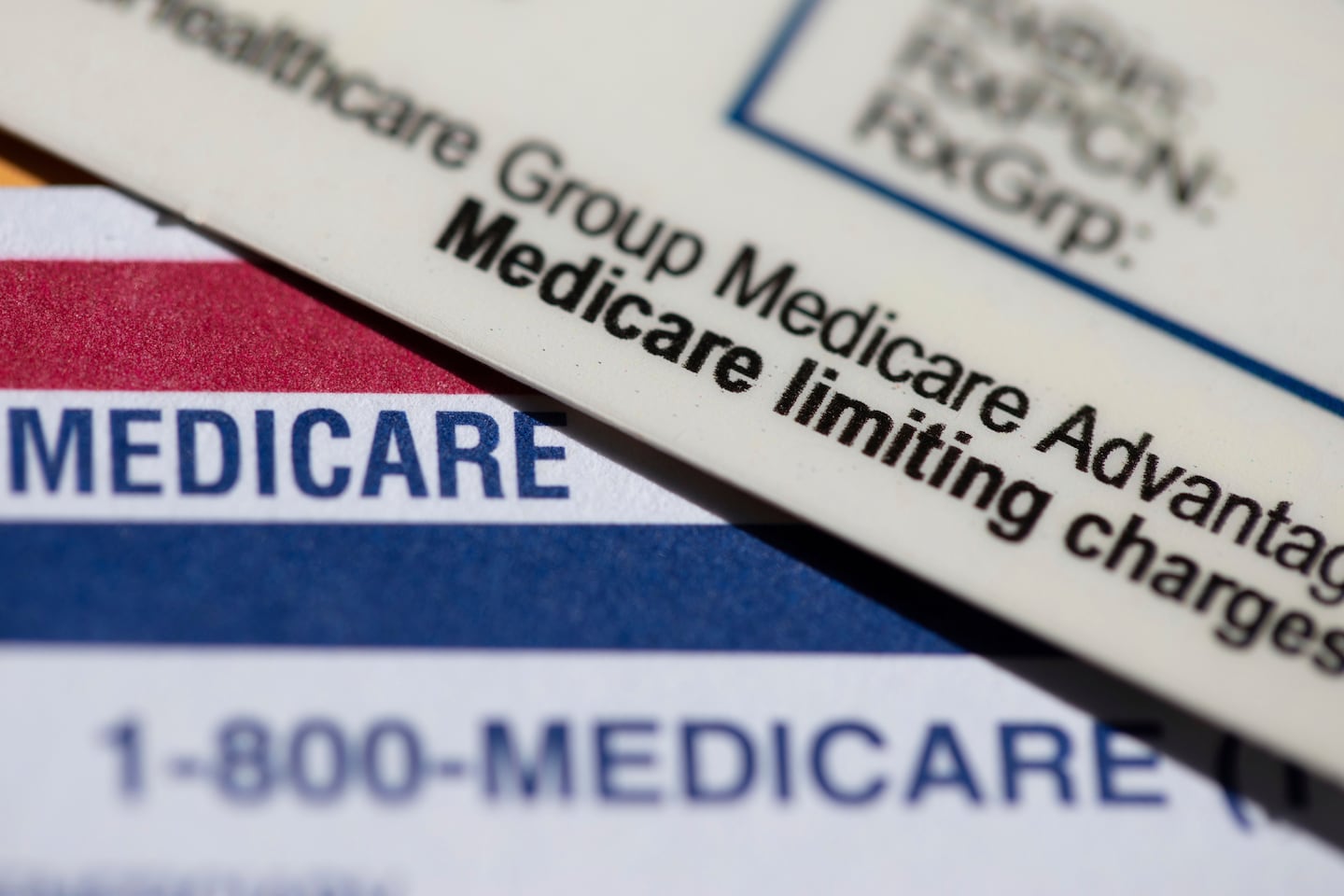 A Medicare Advantage PPO card rests on top of a Medicare card in Portland, Ore., in 2024.
