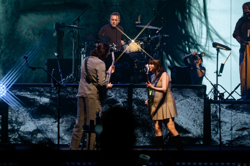 Multi-member ock band Hozier performs concert