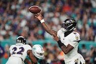 Baltimore Ravens quarterback Lamar Jackson (8) throws against the Miami Dolphins during the...
