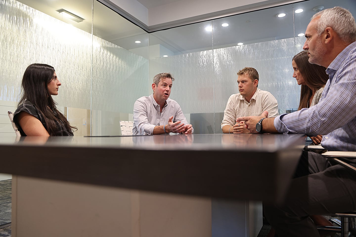Evan Sussman (second from left), CEO of Granata Bio Corp., met with his team, from left, Leigh Guerra, Evan Sussman, Noah Siler, Shelly Frazier, and Stephen Medeiros.