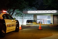 A Dallas police car sits outside of the Dallas Museum of Art after a burglary on June 2....