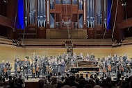 Guest conductor David Robertson (foreground, L and pianist Emanuel Ax acknowledge applause...