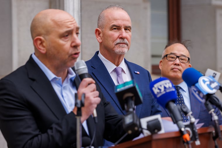 Robert Grabel with Pennsylvania chapter of the Forward Party endorsing Pat Dugan (center) candidate for District Attorney of Philadelphia, Tuesday, October 14, 2025. At right is former Philadelphia City Councilmember David Oh.