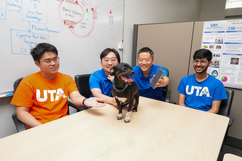 Zhu with some of his student researchers at UT Arlington.