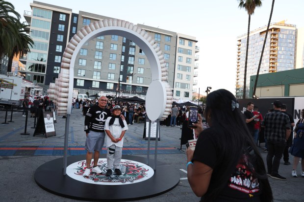 Jonas, left, and AJ from Panorama City pose under a...