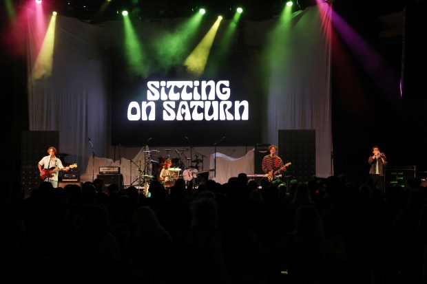 Sitting on Saturn performs during the Rock 2 Freedom benefit...