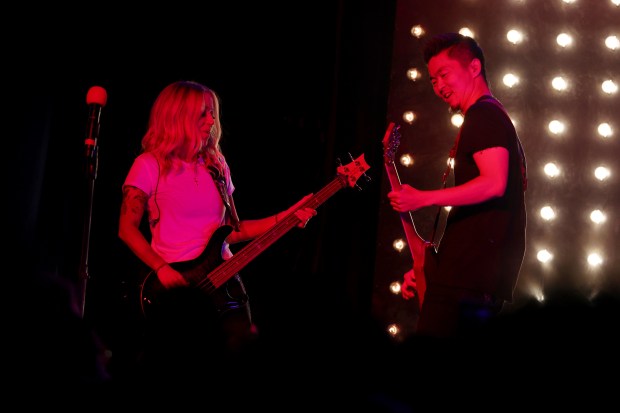 In-N-Out Burger owner and president Lynsi Snyder-Ellingson, left, performs along...