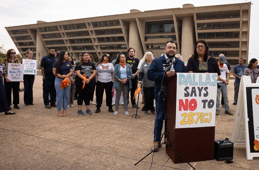 Mayor Pro Tem Jesse Moreno speaks standing next to Council Member Laura Cadena as the...