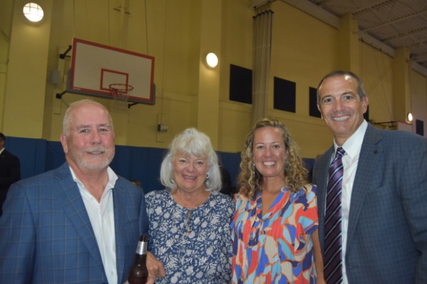 Adam Hepp and his wife Terry Byrne Hepp and Maggie...