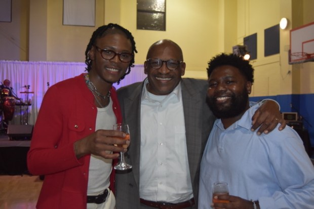 Sahron Samuels, Bryan Carter, President of Gesu School, and Ernie Ross enjoy celebrating the 20th Anniversary of Dancing with the students. (Photo by Maggie Corcoran)