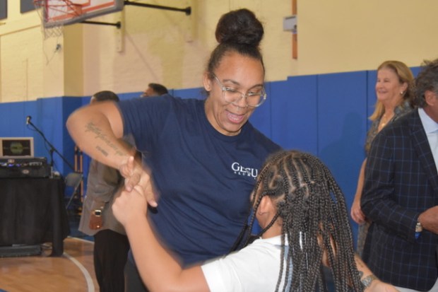 Dancers enjoy a dance at the 20th Anniversary Dancing with the Students celebration. (Photo by Maggie Corcoran)