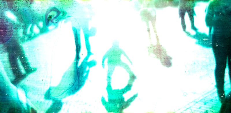 Abstract digital image with high exposure and greenish-blue hues, showing blurred silhouettes of people and shadow shapes over a bright white background, creating an ethereal, dreamlike atmosphere.