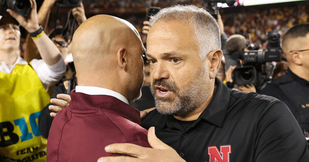 Oct 17, 2025; Minneapolis, Minnesota, USA; Nebraska Cornhuskers head coach Matt Rhule and Minnesota Golden Gophers head coach P.J. Fleck shake hands after the game at Huntington Bank Stadium.