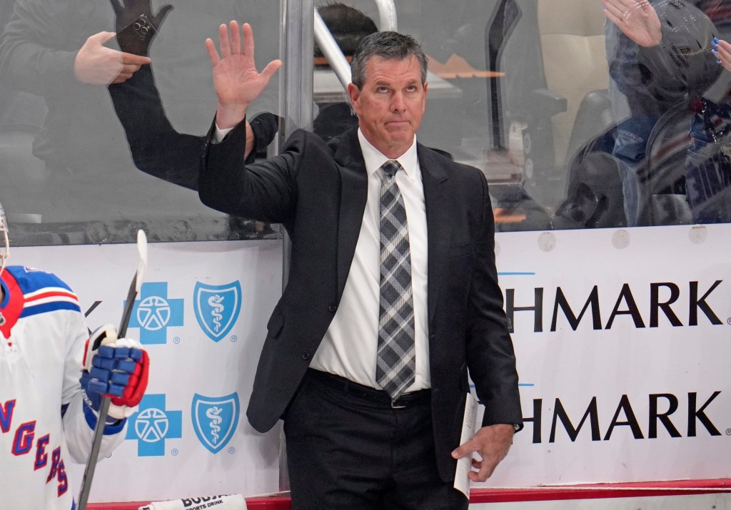 Blueshirts head coach Mike Sullivan acknowledges fans after a scoreboard tribute to his years a Penguins head coach during the first period of the Rangers' 6-1 road win over Pittsburgh on Oct. 11, 2025.
