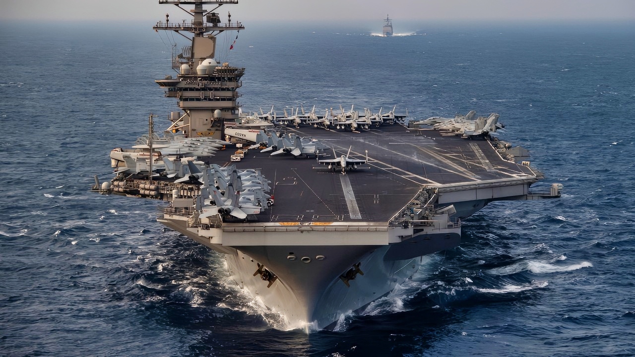 (Nov. 17, 2020) The aircraft carrier USS Nimitz (CVN 68) steams ahead of the guided-missile cruiser USS Princeton (CG 59) while participating in Malabar 2020 in the North Arabian Sea. Malabar 2020 is the latest in a continuing series of exercises that has grown in scope and complexity over the years to address the variety of shared threats to maritime security in the Indo-Asia Pacific where the U.S. Navy has patrolled for more than 70 years promoting regional peace and security. Nimitz Carrier Strike Group is currently deployed to the 7th Fleet area of operations in support of a free and open Indo-Pacific. (U.S. Navy photo by Mass Communication Specialist 3rd Class Elliot Schaudt/Released)