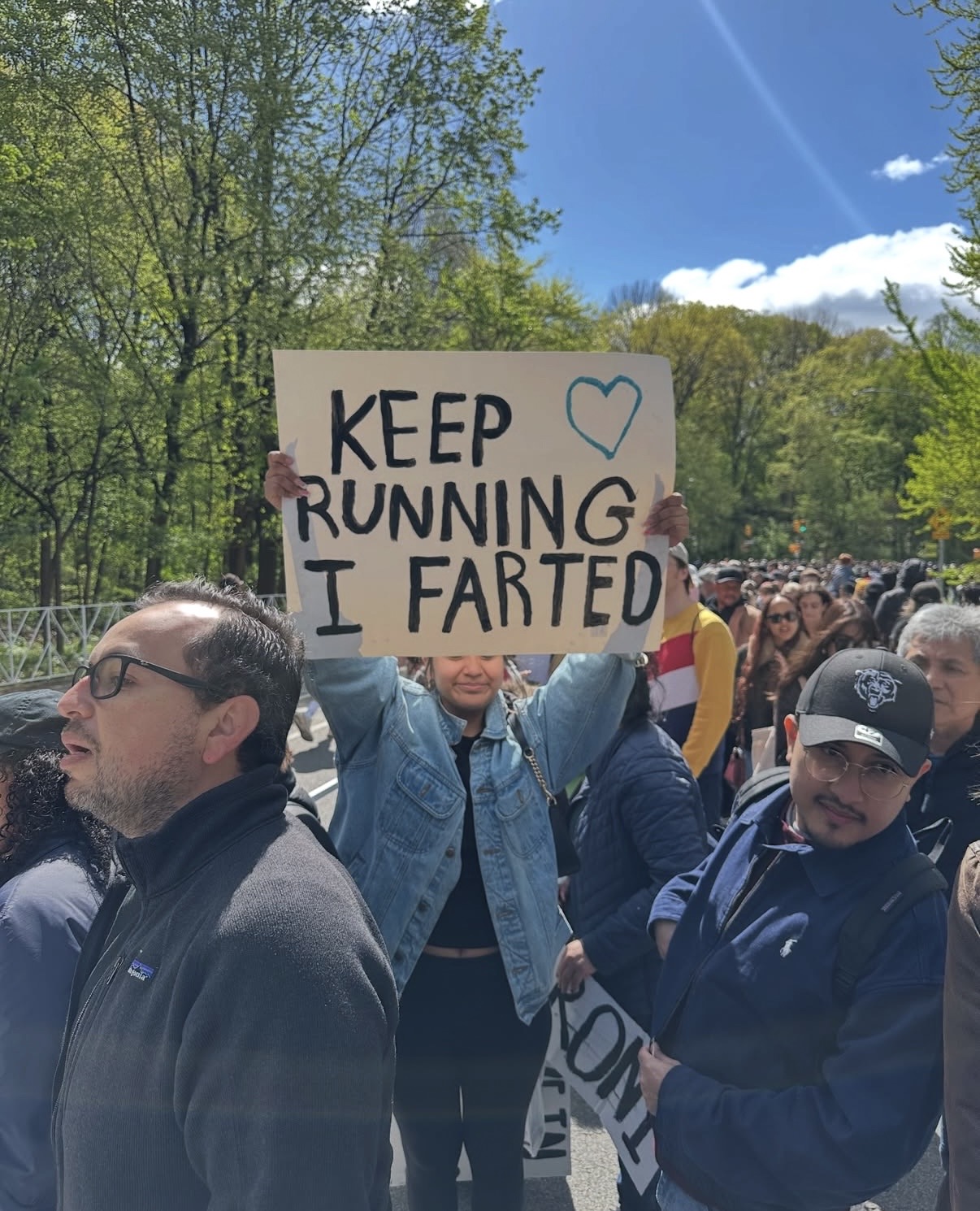 the sign reads: Keep running, I farted