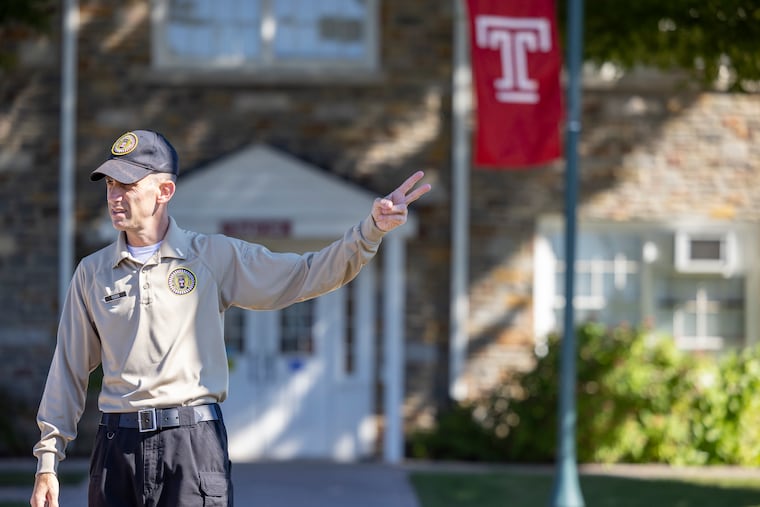“It’s never too late to pursue your dreams,” said Chris Feder, 50, who has always dreamed of becoming a police officer. Last year, he left a higher paying job to go to the police academy and after graduation this week, he’ll become a Temple University police officer. Feder leads a new class of recruits through getting into proper formation during a flag ceremony on Temple’s Ambler campus.