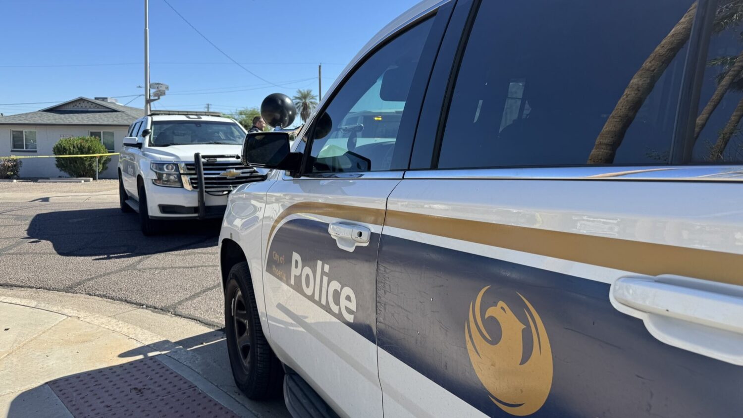 A woman is in the hospital and a suspect is at large after a shooting in north Phoenix on Tuesday e...