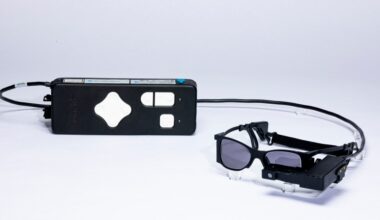 Blind patients read again with smart glasses-linked eye implant