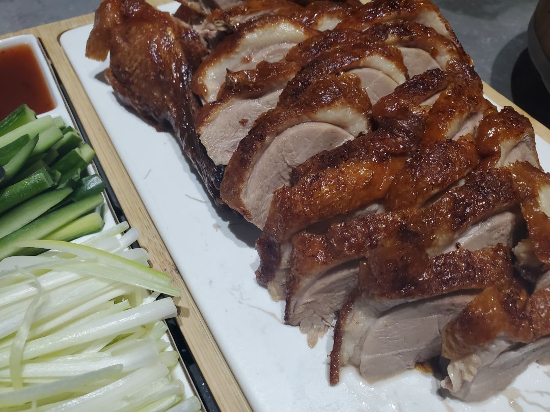 A plate of Beijing duck and sprouts at Duck N Bao.