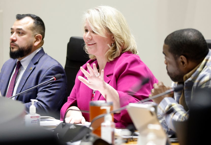 Dallas City Councilwoman Cara Mendelsohn (center) asks a question during a special meeting...