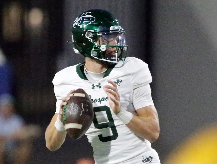 Prosper High School quarterback Braeden Imhoff (9) throws a pass during the first half as...