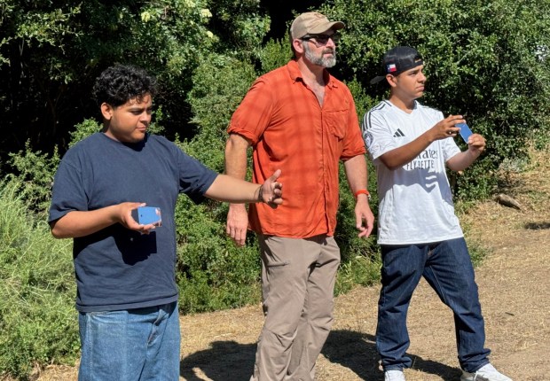 Kit Fox Outfitters co-own Colin Macdonald, center, led teens through an outdoor safety class during one of the Nature Quest activities. (Courtesy Surprise Farm Retreat Center)